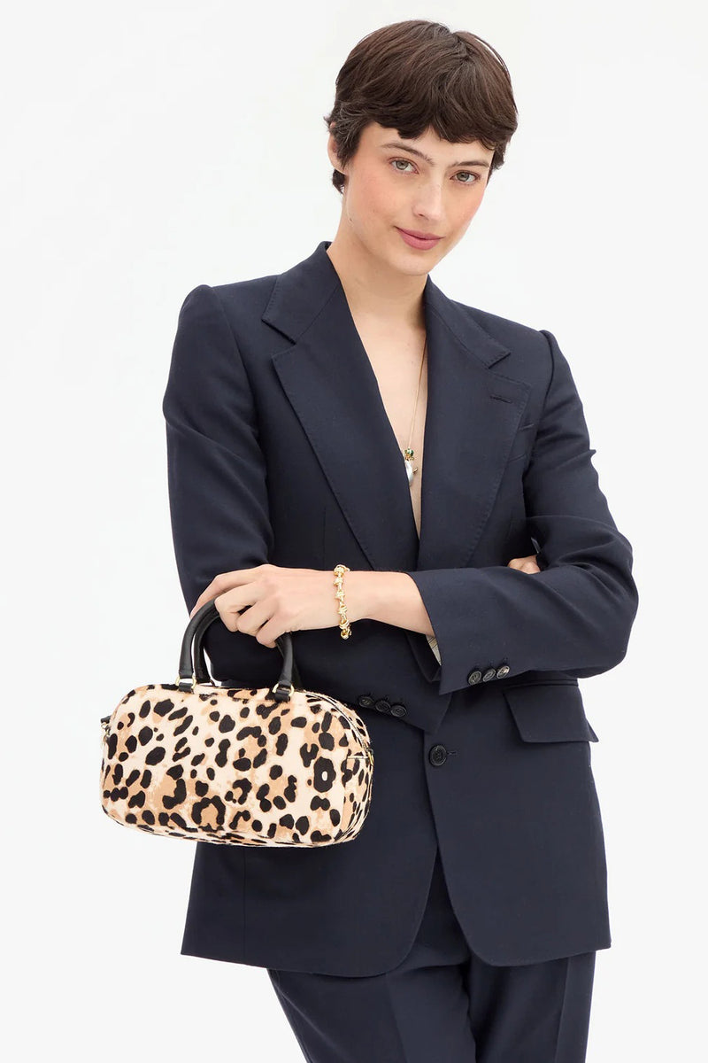 clare v. petite claudine snow leopard