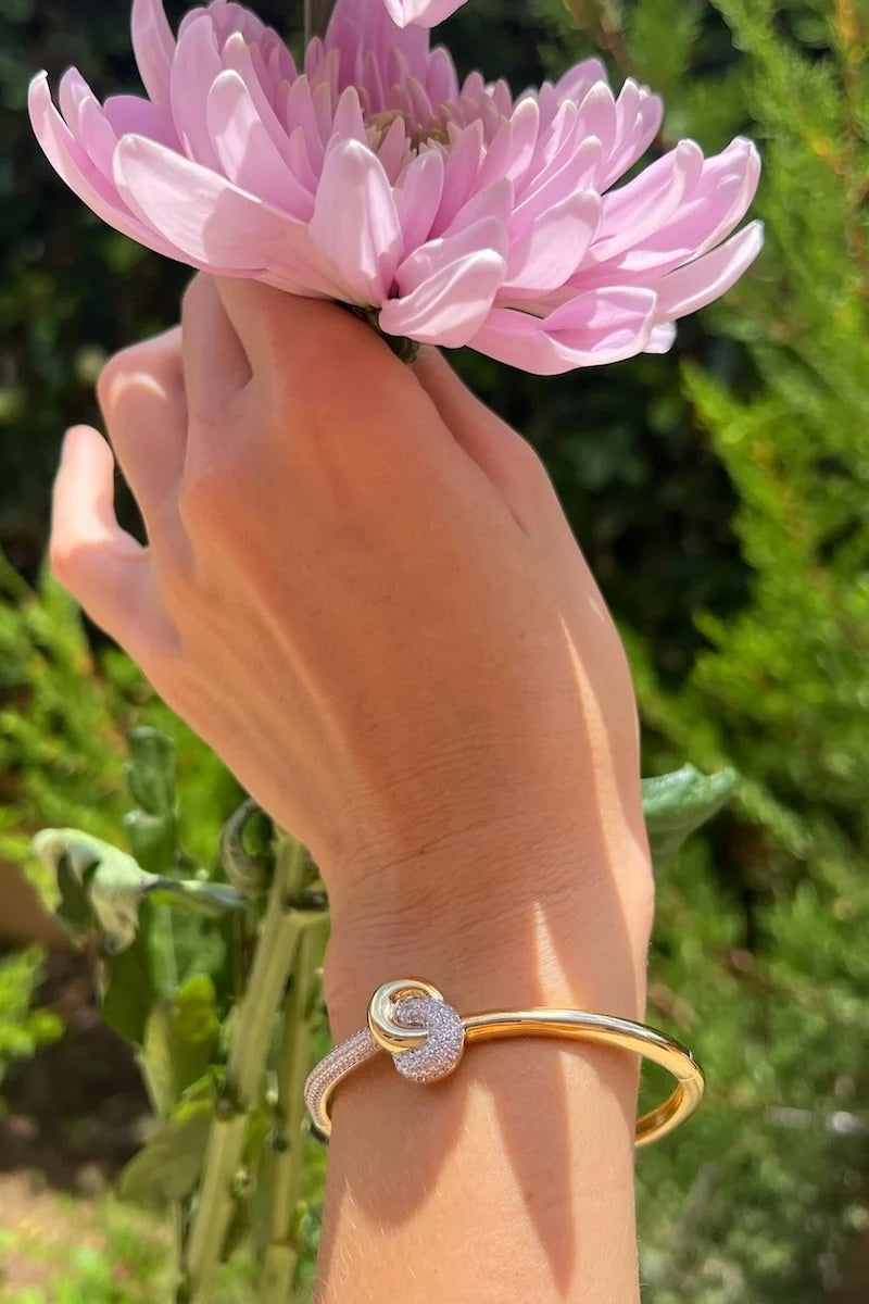 native gem love knot bangle gold and silver duo