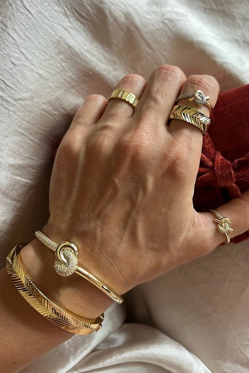 native gem love knot bangle gold plated