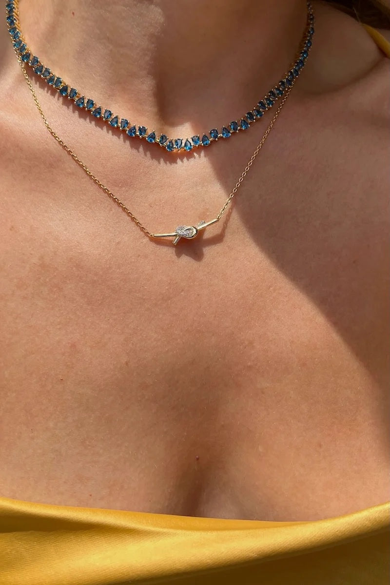 native gem love knot necklace sterling silver and gold plated