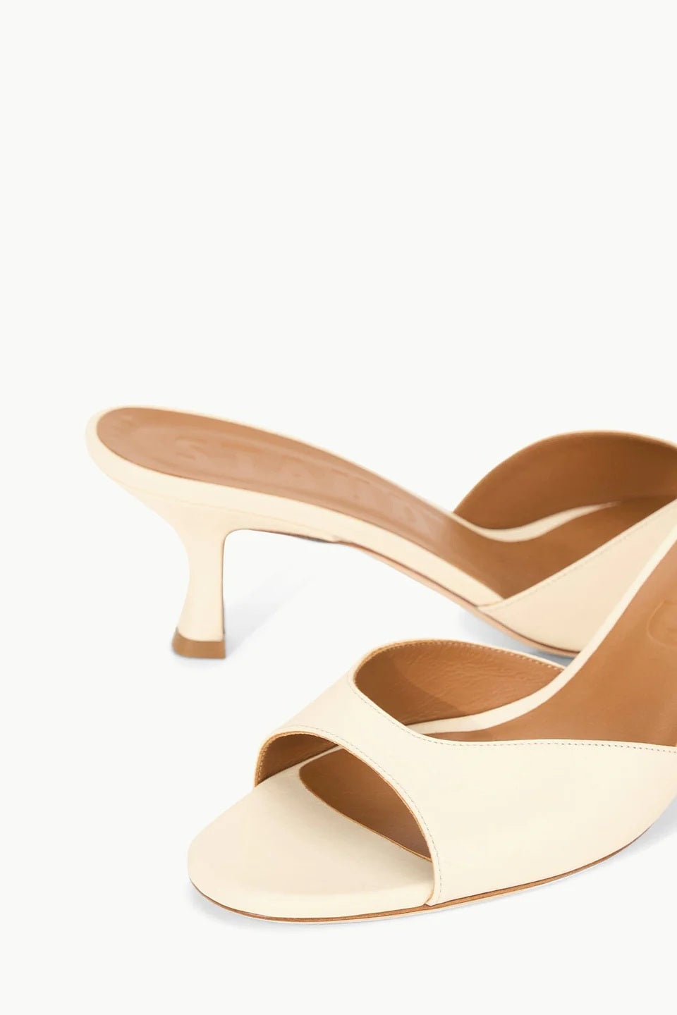 staud brigitte mule cream leather